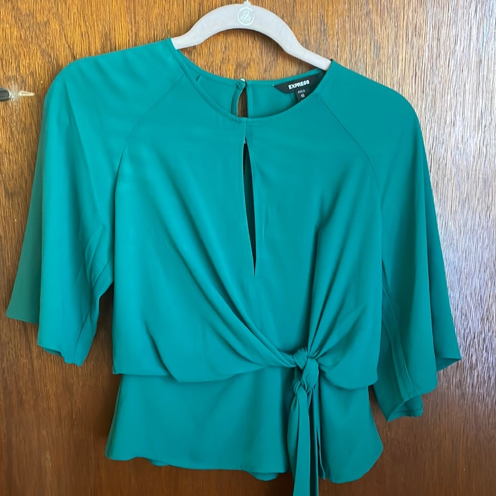 Express beautiful green peplum  keyhole opening front & back EUC